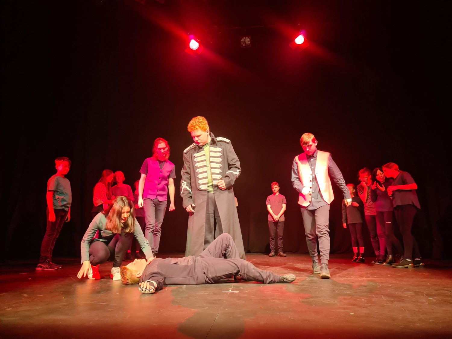 Students performing 'As you Like it' on stage