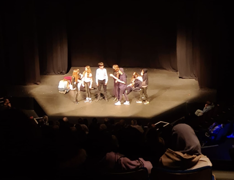 Students performing at Greenwich Theatre on stage