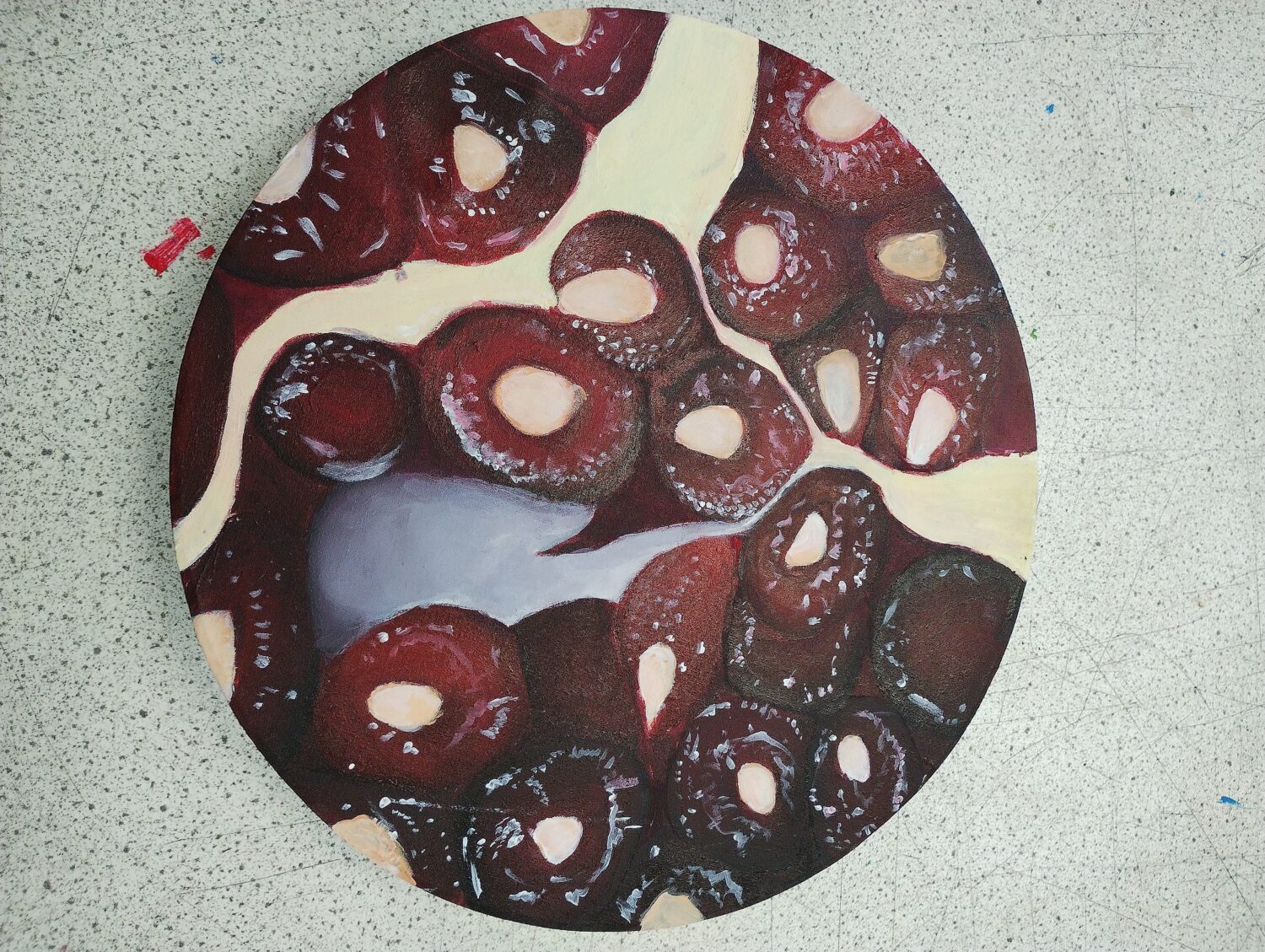 A student's artwork of a pomegranate